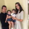 Arnaud Lagardère, Liva, Mila et Jade Foret posent en famille, le 14 mars 2015.