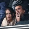 Arnaud Lagardère et sa femme Jade Foret assistent au match PSG-Evian, à Paris le 18 janvier 2014.