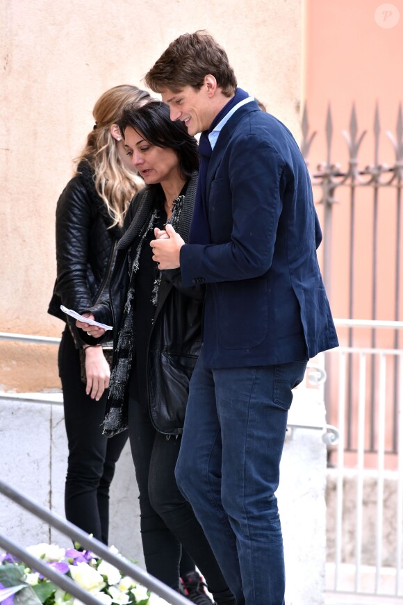 Yannick Agnel et Sophie Kamoun lors des obsèques de Camille Muffat en l'église Saint Jean-Baptiste-Le Vœu à Nice, le 25 mars 2015