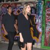 Taylor Swift lors d'une soirée à Los Angeles en compagnie de son jeune frère Austin le 15 mars 2015