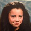Anne-Gaëlle Riccio pose dans les années 80 pour un portrait scolaire.