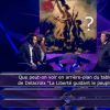 Mathieu Madénian, Hélène Ségara et Jean-Pierre Foucault dans Qui veut gagner des millions ? sur TF1, le vendredi 27 mars 2015.