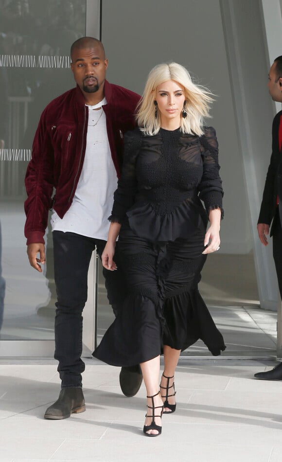 Kanye West et sa femme Kim Kardashian - Sorties du défilé de mode "Louis Vuitton", collection prêt-à-porter automne-hiver 2015/2016 à la fondation Louis Vuitton à Paris. Le 11 mars 2015
