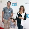 Tiffani Thiessen, enceinte, avec son mari Brady Smith et leur fille Harper à la 6ème soirée annuelle de « Milk+Bookies » à Los Angeles, le 19 avril 2015