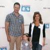 Tiffani Thiessen, enceinte, avec son mari Brady Smith et leur fille Harper à la 6ème soirée annuelle de « Milk+Bookies » à Los Angeles, le 19 avril 2015  
