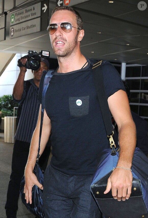 Chris Martin arrive à Los Angeles le 6 septembre 2014.