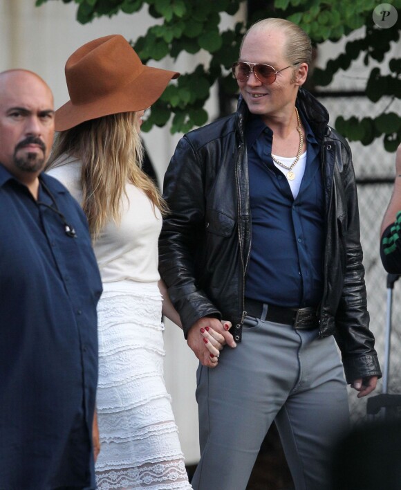 Johnny Depp et sa fiancée Amber Heard - Amber Heard rend visite à son fiancé Johnny Depp sur le tournage de "Black Mass" à Lynn dans le Massachusett le 21 juillet 2014. 