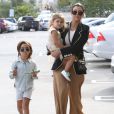 Kourtney Kardashian et ses enfants Penelope et Mason - La famille Kardashian à la messe de Pâques à Calabasas. Le 5 avril 2015