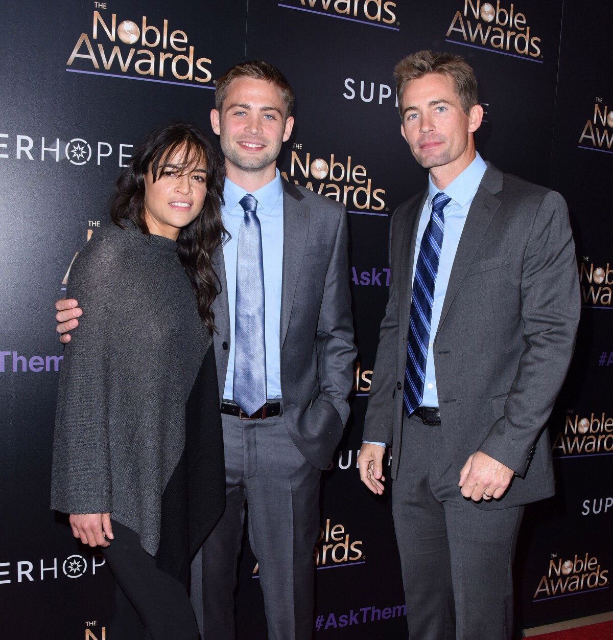 Photo : Michelle Rodriguez, Cody Walker, Caleb Walker à Beverly Hills, Los  Angeles, le 27 février 2015. - Purepeople