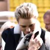La princesse Charlene de Monaco avec son petit chihuahua "Monte" lors de la 5e édition du "Tournoi Sainte-Dévote" le samedi 11 avril 2015, au Stade Louis II de Monaco