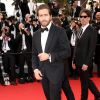 Jake Gyllenhaal, membre du jury - Montée des marches du film "La Tête Haute" pour l'ouverture du 68e Festival du film de Cannes le 13 mai 2015. Il porte une montre Chopard