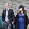  Charles Spencer, frère de Lady Di, et son épouse Karen, enceinte de leur fille Charlotte, lors d'un mariage en juin 2012 