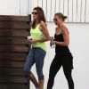 Cindy Crawford et une amie à la sortie de son cours de gym à Miami, le 15 mai 2015 Cindy Crawford in Miami.