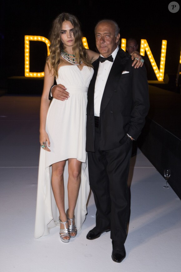 Cara Delevingne et Fawaz Gruosi assistent à la soirée "Divine" organisée par de Grisogono à l'hôtel Eden Roc au Cap d'Antibes. Le 19 mai 2015.