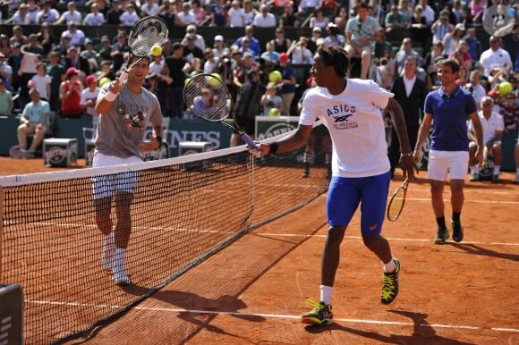 Novak Djokovic et Gaël Monfils lors du Kid's Day à Roland-Garros le 23 mai 2015 à Paris