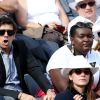 Patrick Bruel et une amie, Anaïs Demoustier, Catherine Frot - People dans les tribunes des Internationaux de France de tennis de Roland-Garros à Paris, le 2 juin 2015.