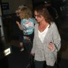 Ashlee Simpson arrive a l'aeroport LAX de Los Angeles, en provenance de Miami, en compagnie de son fils Bronx et de sa mere Tina. Le 1er janvier 2013 