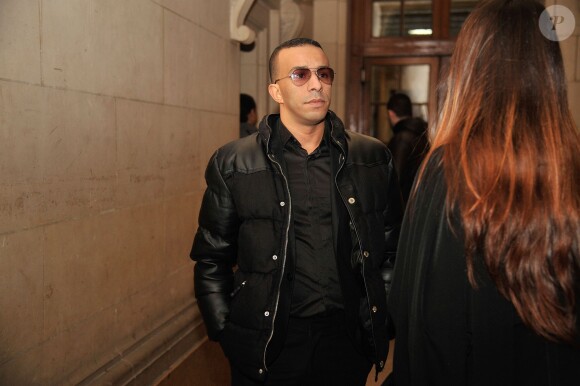 Abousofiane Moustaid lors de l'ouverture de son procès pour proxénétisme aggravé dans l'Affaire Zahia, le 20 janvier 2014 devant la 16e chambre correctionnelle du Palais de Justice de Paris