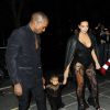 Kim Kardashian, Kanye West et leur fille North à Paris, le 29 septembre 2014. 