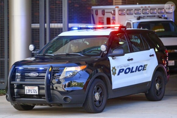 P. Diddy dans une voiture de police après son altercation avec le coach de son fils à UCLA le 22 juin 2015. 