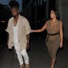 Kim Kardashian, enceinte, et son mari Kanye West sont allés dîner au restaurant Hakkasan à Londres, le 25 juin 2015.