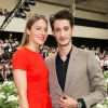 Pierre Niney et Natasha Andrews - Défilé Dior Homme printemps-été 2016 au Tennis Club de Paris le 27 juin 2015.