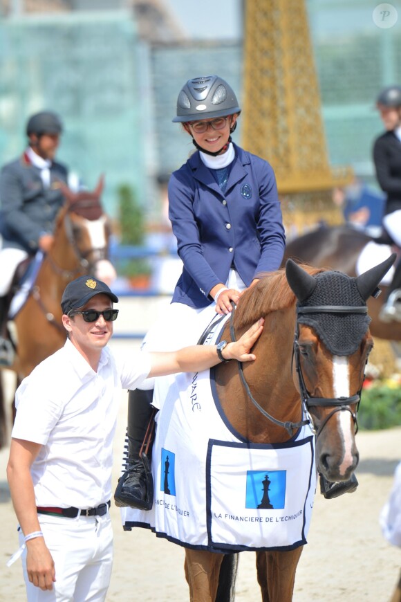 Guillaume Canet et sa nièce Paloma de Crozals lors du Paris Eiffel Jumping du Champs-de-Mars à Paris, le 3 juillet 2015