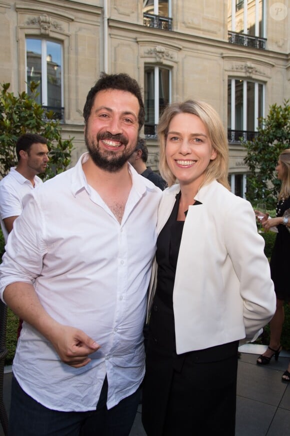 Le producteur, scénariste, réalisateur Emmanuel Sapolsky et Géraldine Dobey (Directrice générale de l'Hôtel Barrière Le Fouquet's Paris) - Cocktail pour le film "Monica's List " à l'hôtel Barrière Fouquet's à Paris, France le 29 juin 2015.