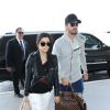 Kourtney Kardashian et son fiancé Scott Disick arrivent à l'aéroport de Los Angeles pour prendre un vol, le 24 mars 2014.  