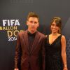 Lionel Messi et sa compagne Antonella Roccuzzo lors de la cérémonie du Ballon d'Or 2014 à la Kongresshalle de Zurich, le 12 janvier 2015