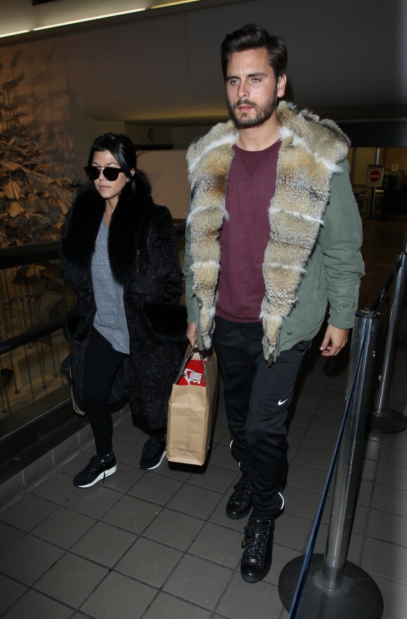 Kourtney Kardashian et Scott Disick arrivent à Los Angeles en provenance de New York, le 24 février 2014.  