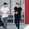 Semi-Exclusif - Harry Styles fait du shopping avec un ami à Los Angeles, le 7 juillet 2015.  