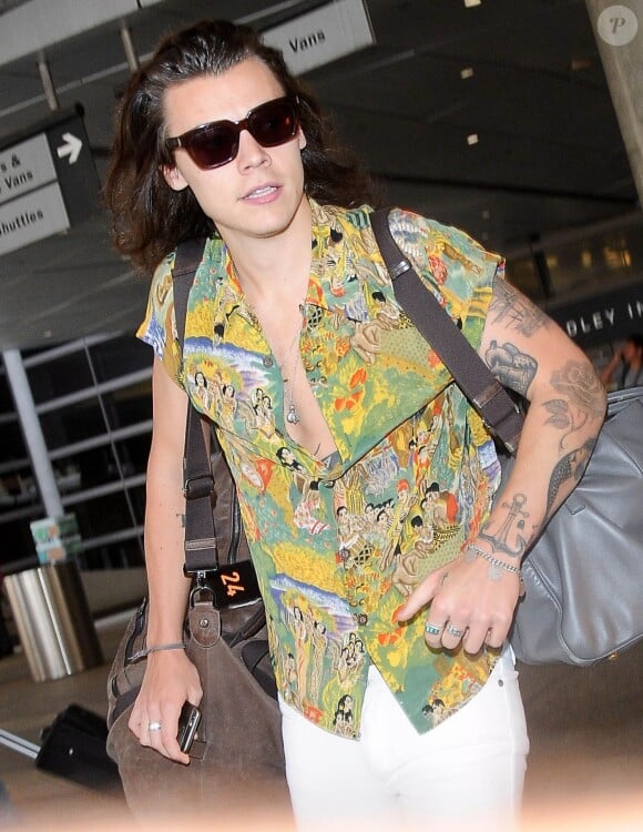 Harry Styles arrive à l'aéroport de LAX à Los Angeles, le 3 juillet 2015 