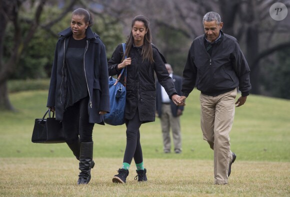 Michelle, Barack et Malia Obama à la Maison Blanche. Washington, le 4 janvier 2015.