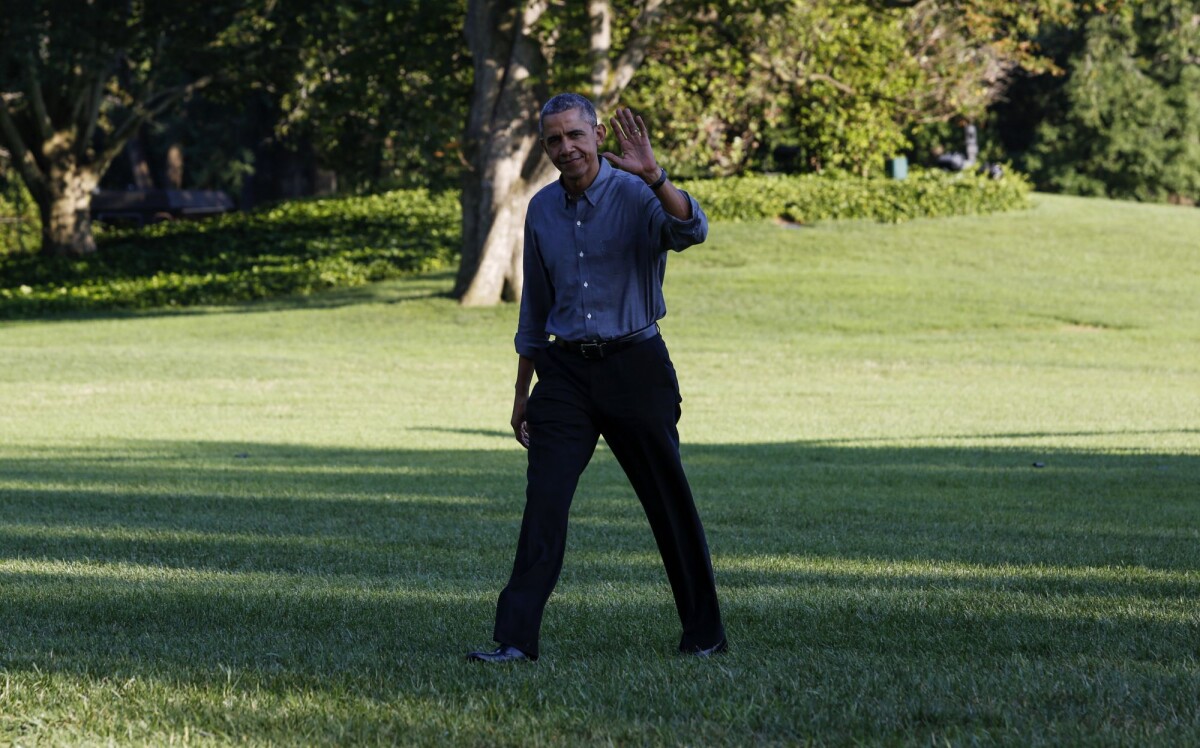 Photo : Barack Obama de retour à la Maison Blanche après deux jours à ...
