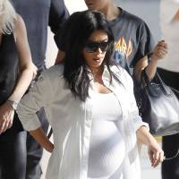 Kim Kardashian, enceinte : Ravissant défilé et retrouvailles avec Rob !