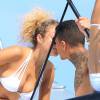 Exclusif - Le joueur du PSG Gregory Van Der Wiel et sa petite amie en vacances, à Ibiza, le 9 août 2015.