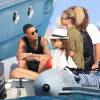 Exclusif - Le joueur du PSG Gregory Van Der Wiel et sa petite amie en vacances, à Ibiza, le 9 août 2015.