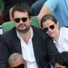 Le chef Jean-François Piège et sa femme Elodie (enceinte) - People dans les tribunes lors du tournoi de tennis de Roland-Garros à Paris, le 28 mai 2015.