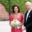 Le roi Carl XVI Gustaf de Suède et la reine Silvia à leur arrivée le 26 août 2015 pour la cérémonie du Stockholm Water Prize. 