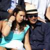 Marion Bartoli et son compagnon très amoureux dans les tribunes lors de la demi-finale des Internationaux de tennis de Roland-Garros à Paris, le 5 juin 2015.