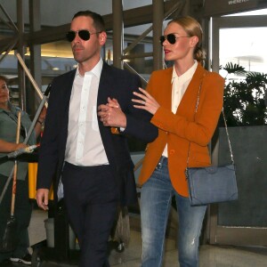 Kate Bosworth et son mari Michael Polish prennent un vol à l'aéroport de Los Angeles, le 14 mai 2014.