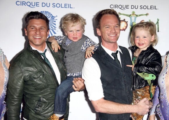 Neil Patrick Harris, son compagnon David Burtka, leur fils Gideon et leur fille Harper - Personnalites venues voir le spectacle Totem du Cirque du Soleil sous le Grand Chapiteau au Santa Monica Pier, a Santa Monica, le 21 janvier 2014.