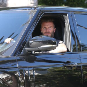 Exclusif - David Beckham se promène au volant de sa Range Rover SUV avec son fils Brooklyn à Los Angeles, le 4 aout 2015