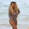 Serena Williams et Caroline Wozniacki profitent du beau temps sur une plage à Miami, le 31 mai 2014.