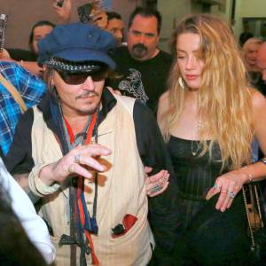 Johnny Depp et Amber Heard quittent le Rock in Rio où se produisaient les Hollywood Vampires, Rio de Janeiro, le 24 septembre 2015.