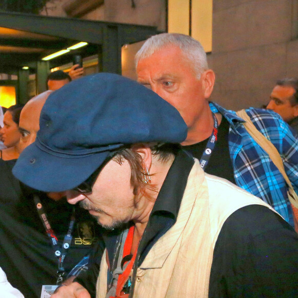 Johnny Depp et Amber Heard quittent le Rock in Rio où se produisaient les Hollywood Vampires, Rio de Janeiro, le 24 septembre 2015.