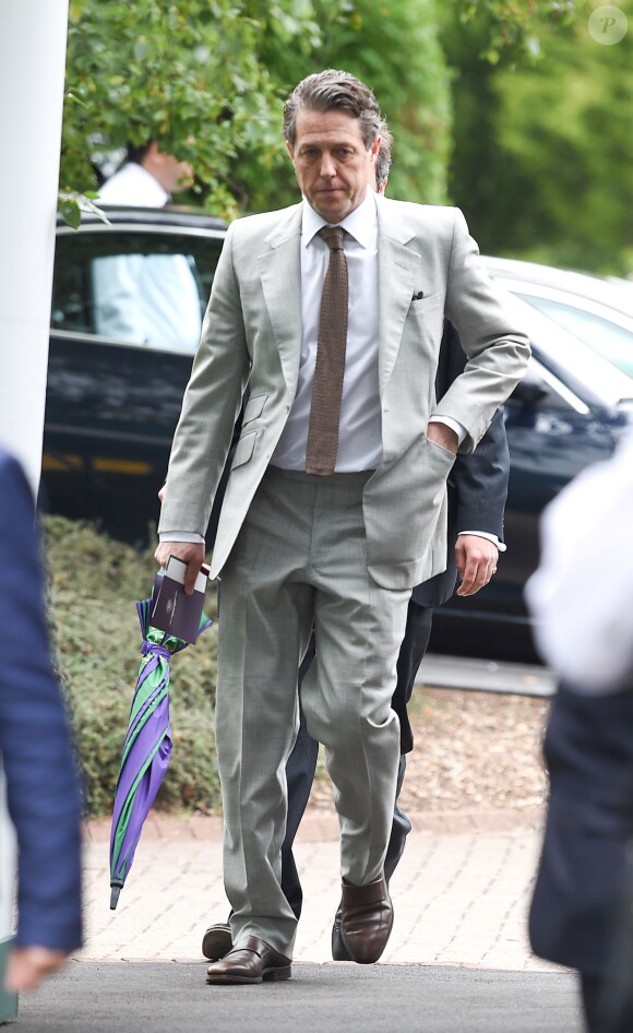 Hugh Grant - People arrivant pour assister à la finale hommes du tournoi de tennis de Wimbledon à Londres, le 12 juillet 2015.