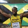 Usain Bolt après sa victoire sur le 100 mètres en finale des Championnats du monde d'athlétiqme, à Pékin, le 23 août 2015