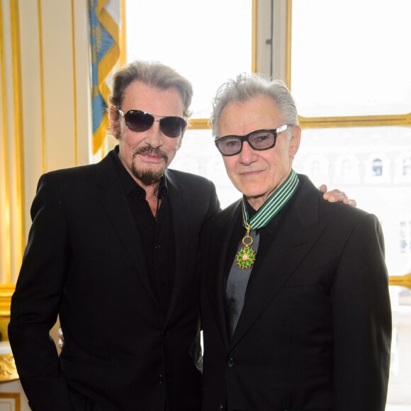 Johnny Hallyday et Harvey Keitel - Remise de décoration de Commandeur de l'Ordre des Arts et des Lettres à Harvey Keitel au ministère de la culture à Paris le 13 octobre 2015.